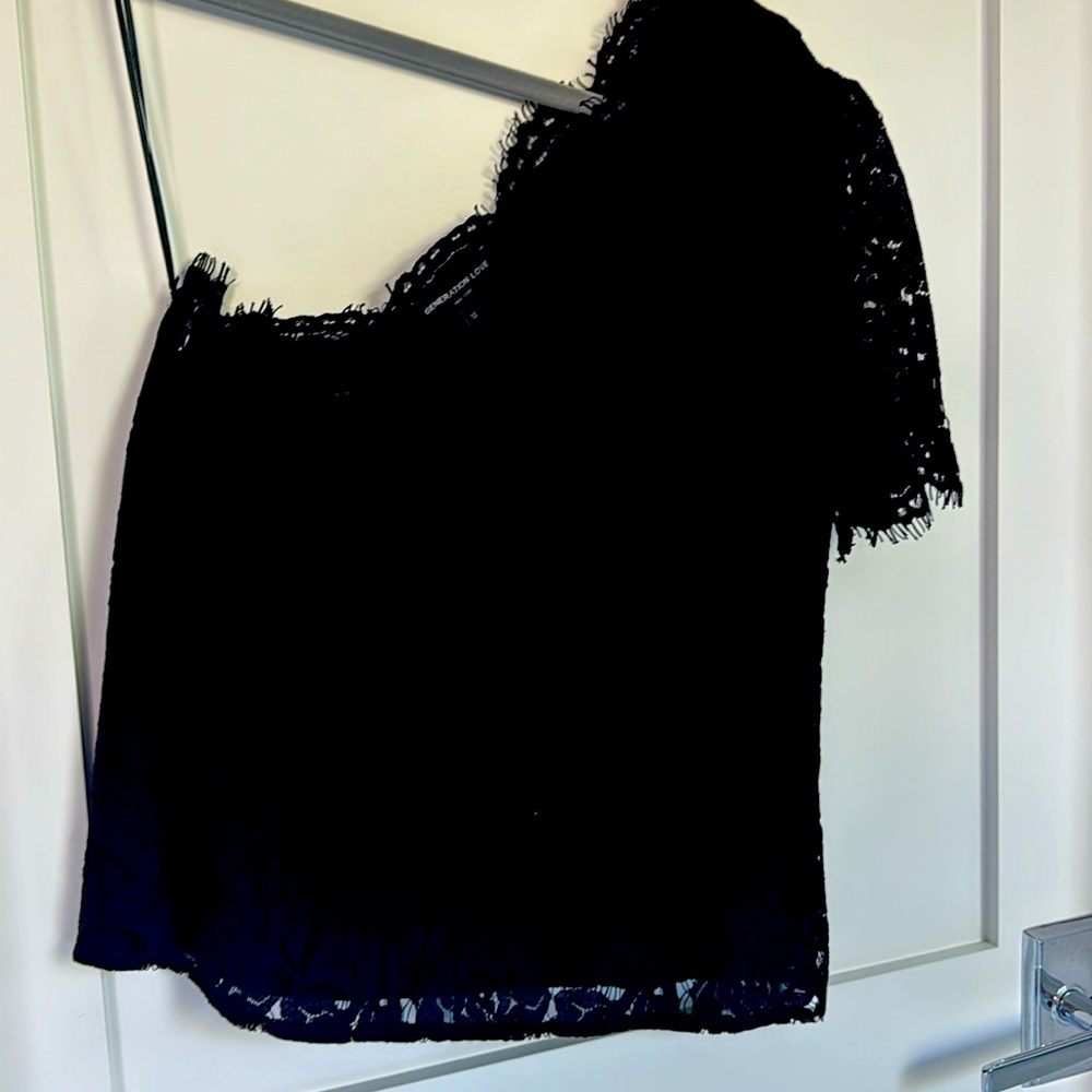 Black lace one shoulder shirt.